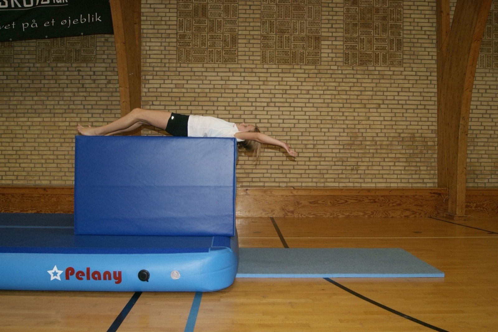 Baglæns rulle, sidste del af baglæns salto